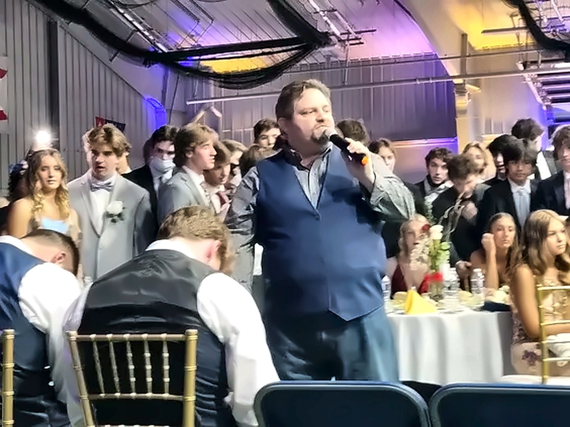 After prom hypnotist Michael Oddo performing clean grad night entertainment for students